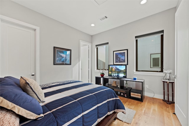 bedroom featuring light hardwood / wood-style floors