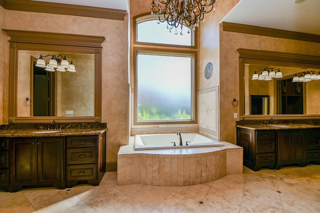 bathroom featuring ornamental molding, vanity, a relaxing tiled tub, an inviting chandelier, and tile patterned flooring