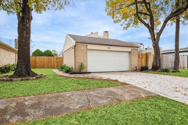 view of property exterior featuring a lawn and a garage