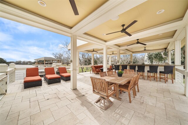 view of patio / terrace featuring an outdoor bar