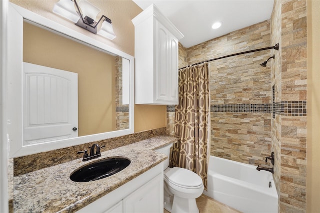 full bathroom featuring shower / bath combination with curtain, vanity, and toilet