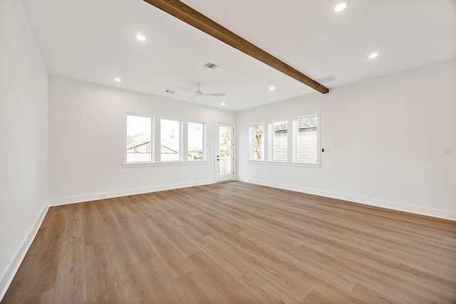 interior space with ceiling fan, beam ceiling, and light hardwood / wood-style flooring