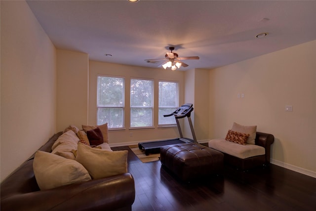 interior space with ceiling fan and dark hardwood / wood-style floors