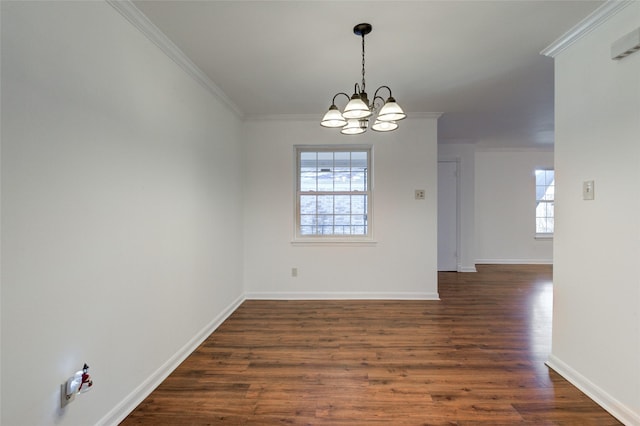 unfurnished dining area featuring dark hardwood / wood-style flooring, a notable chandelier, and ornamental molding