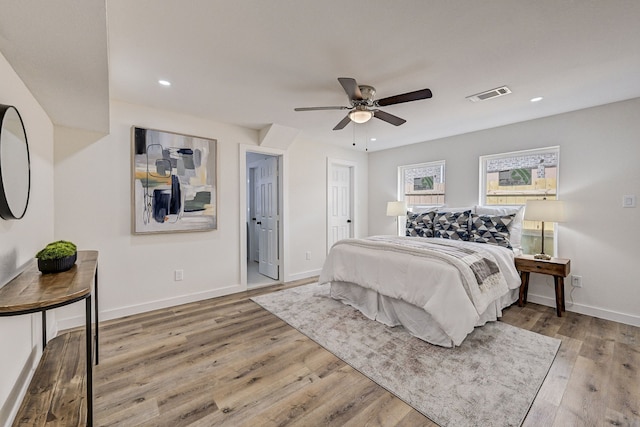 bedroom featuring ceiling fan and hardwood / wood-style floors