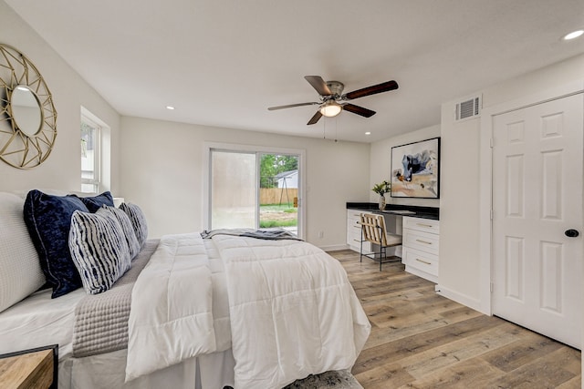 bedroom featuring light hardwood / wood-style flooring and ceiling fan