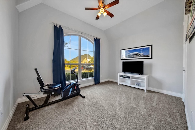 living area with carpet flooring, ceiling fan, and vaulted ceiling