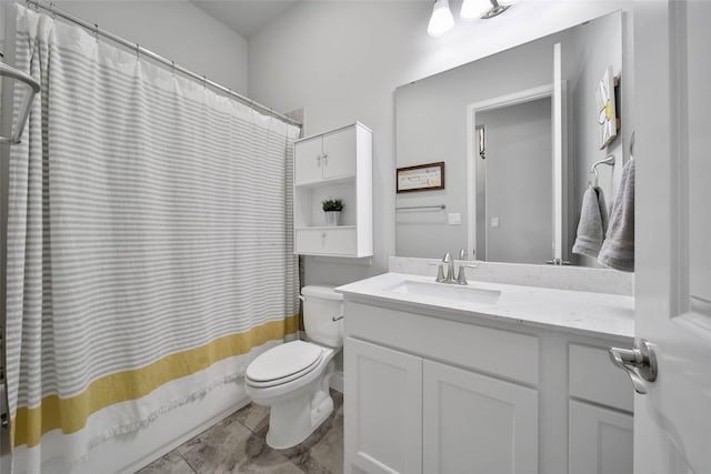 full bathroom with vanity, toilet, and shower / bath combo