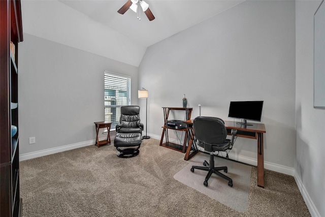 office area featuring ceiling fan, carpet floors, and vaulted ceiling