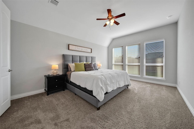 carpeted bedroom featuring vaulted ceiling and ceiling fan