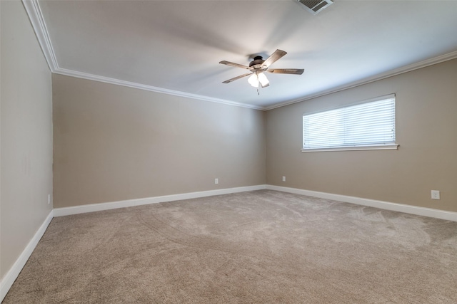 unfurnished room featuring carpet floors, ceiling fan, and ornamental molding