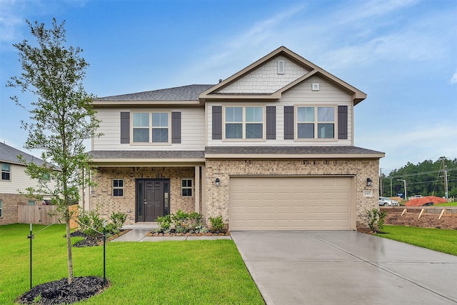 449 Terra Vista Cir, Montgomery, TX 77356 - view of front facade with concrete driveway, an attached garage, brick siding, and roof with shingles