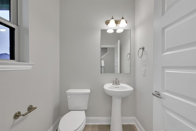 bathroom featuring toilet