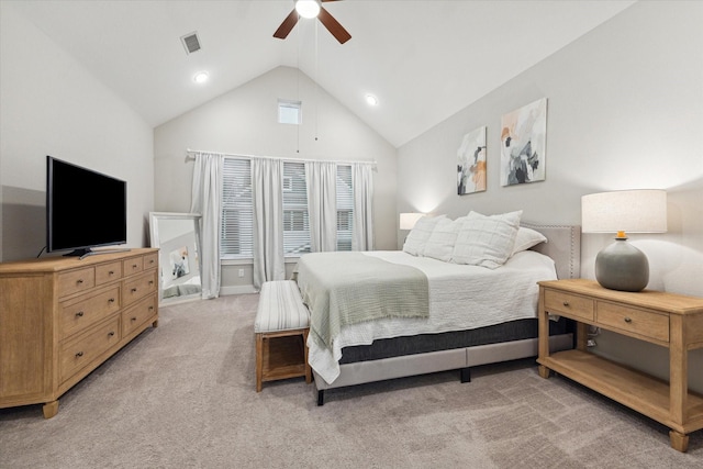 carpeted bedroom with high vaulted ceiling and ceiling fan