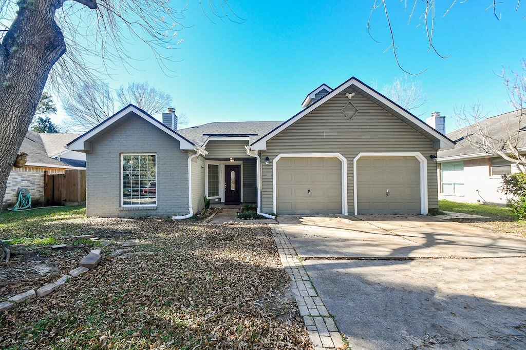 ranch-style house with a garage