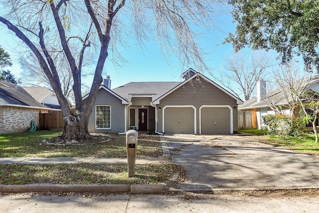 view of front of home featuring central AC unit and a garage