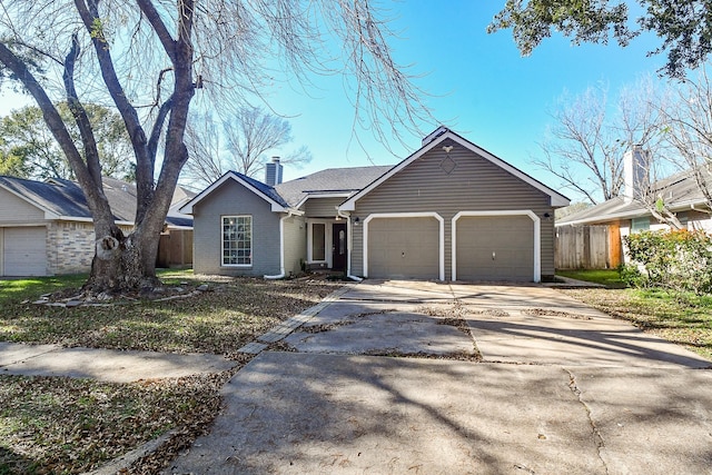 ranch-style home featuring a garage