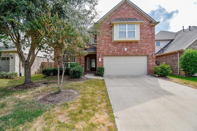 front facade featuring a garage and a front yard