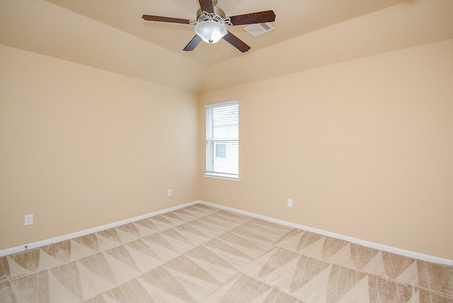 unfurnished room featuring ceiling fan, carpet floors, and lofted ceiling