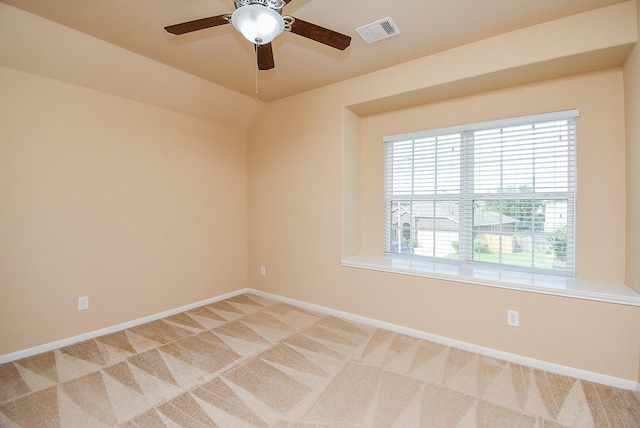 carpeted empty room with ceiling fan