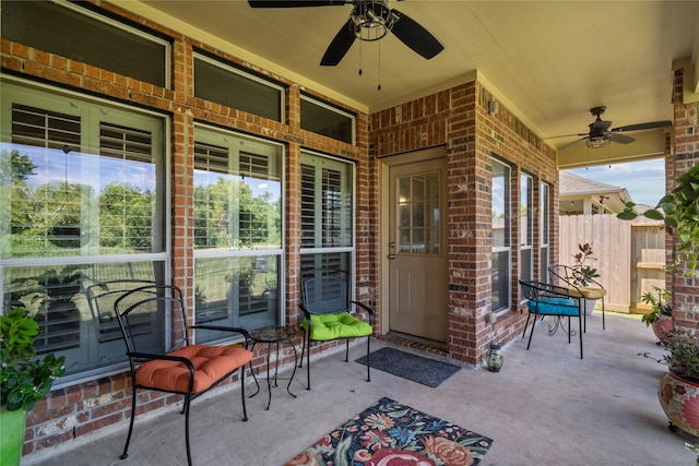 view of patio featuring ceiling fan