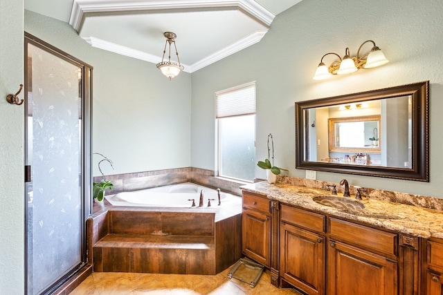 bathroom with tile patterned flooring, vanity, crown molding, and tiled tub