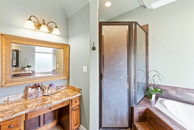 bathroom featuring shower with separate bathtub, vanity, vaulted ceiling, and ornamental molding