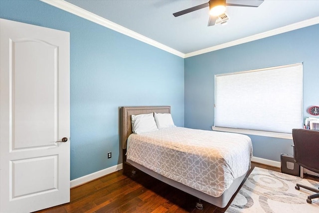 bedroom with ceiling fan, ornamental molding, and dark wood-type flooring