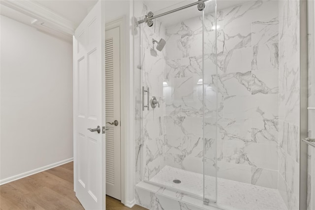 bathroom with wood-type flooring and walk in shower