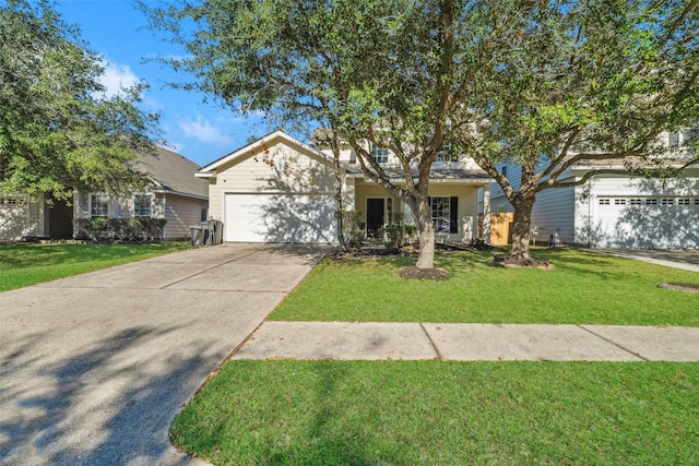 view of front facade featuring a garage and a front yard