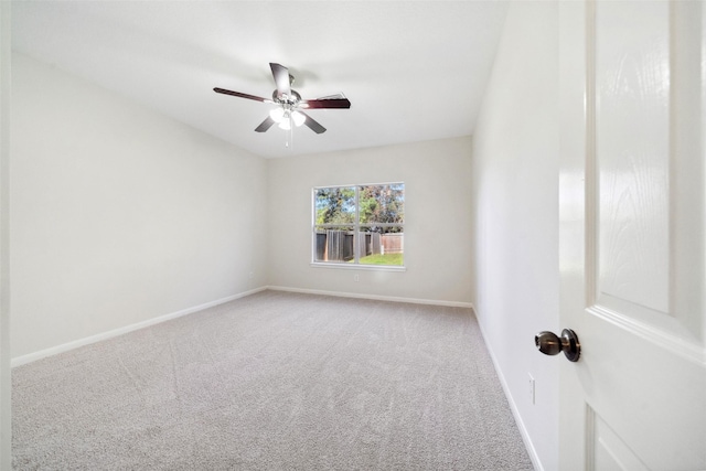 unfurnished room with ceiling fan and carpet floors