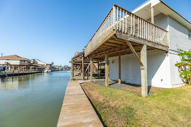 dock area with a water view