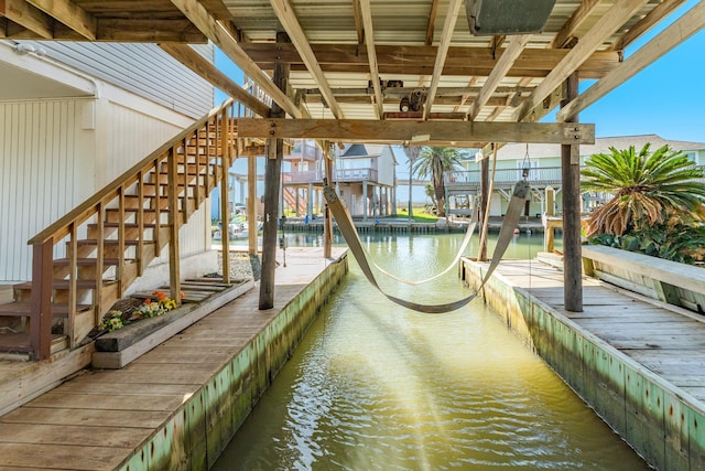 dock area featuring a water view