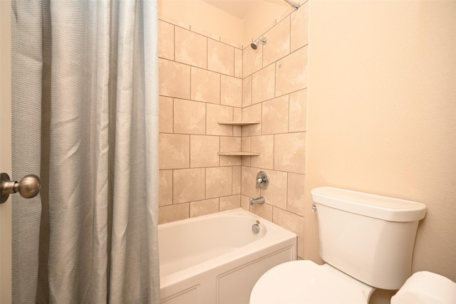 bathroom with shower / bath combination with curtain and toilet