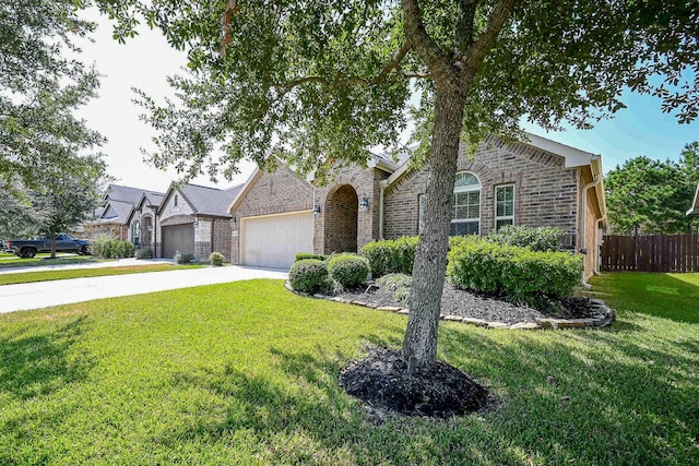 view of front facade featuring a front lawn and a garage