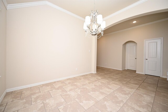 unfurnished room with a chandelier and ornamental molding