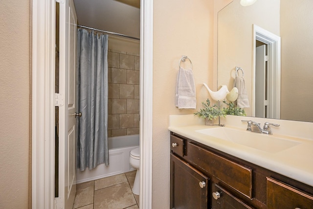 full bathroom featuring shower / bath combination with curtain, vanity, toilet, and tile patterned floors