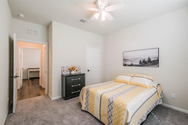 bedroom with ceiling fan and carpet