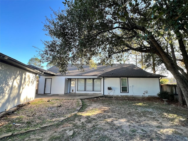 back of house featuring a patio