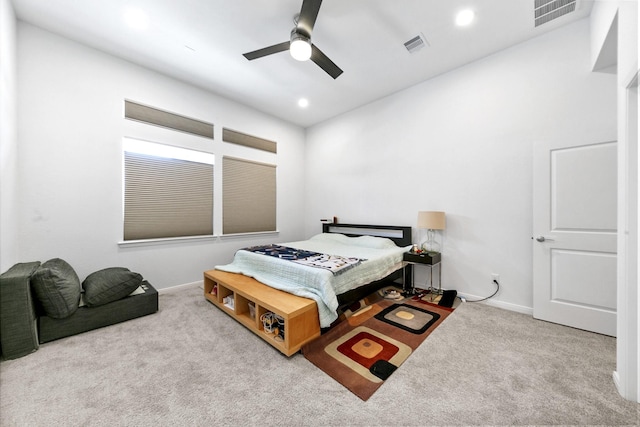 bedroom featuring ceiling fan and light carpet