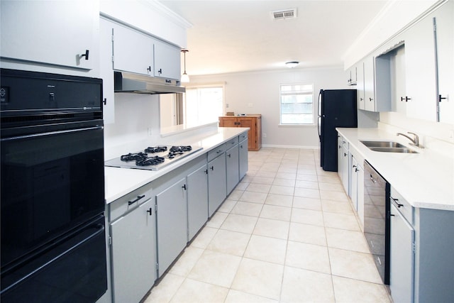 kitchen featuring ornamental molding, sink, black appliances, light tile patterned floors, and gray cabinets