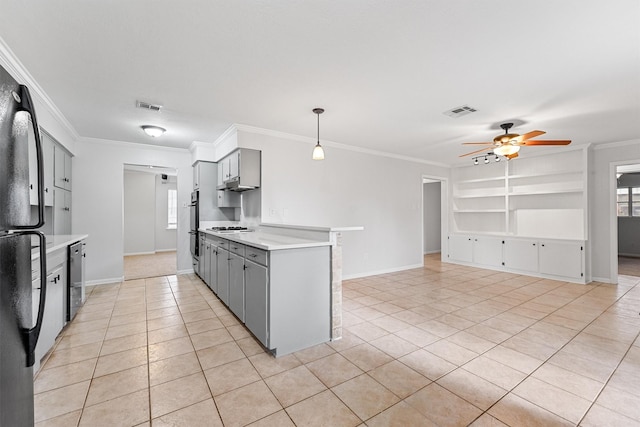 kitchen featuring light tile patterned flooring, gray cabinetry, ornamental molding, black fridge, and built in shelves