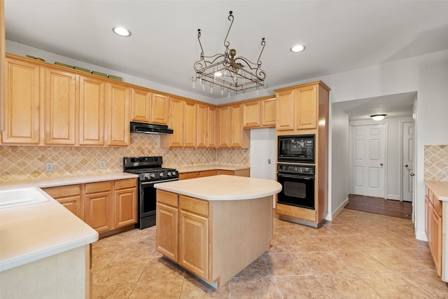 kitchen with backsplash, sink, black appliances, light brown cabinets, and a center island