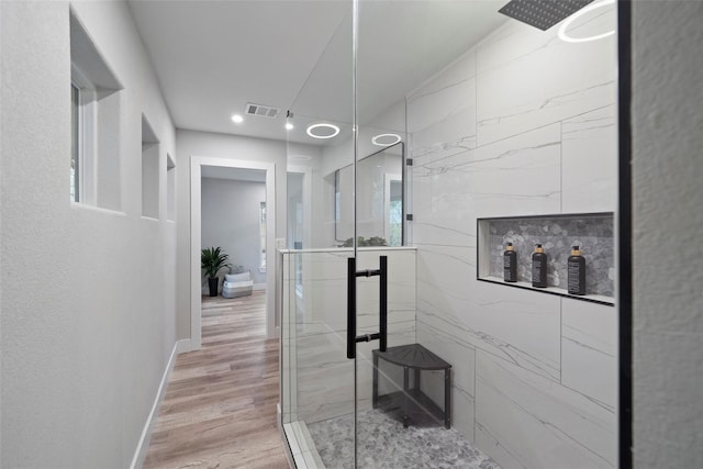 corridor featuring light hardwood / wood-style flooring