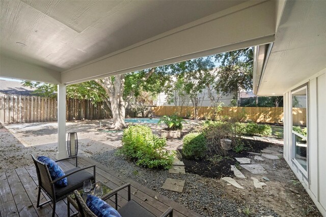 view of patio / terrace featuring a fenced in pool