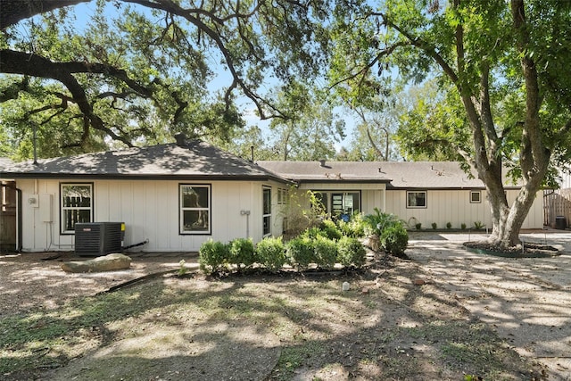 back of property with central AC unit