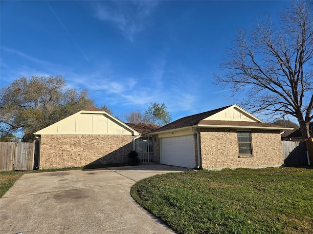 view of side of home featuring a lawn and a garage