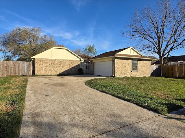 view of property exterior featuring a garage and a lawn