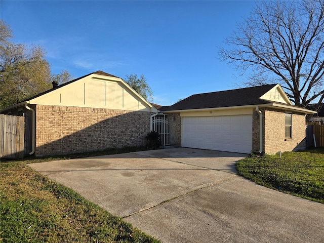 single story home featuring a garage