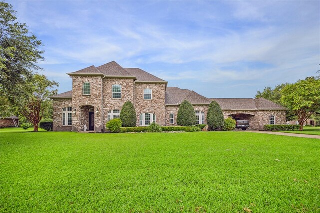 view of front of home with a front yard